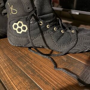 Jordan Black and Gold Sneakers